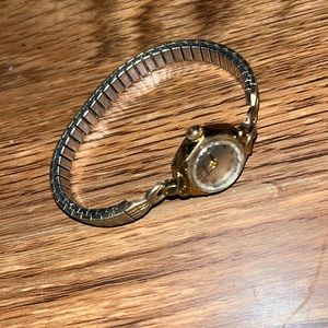Small gold watch